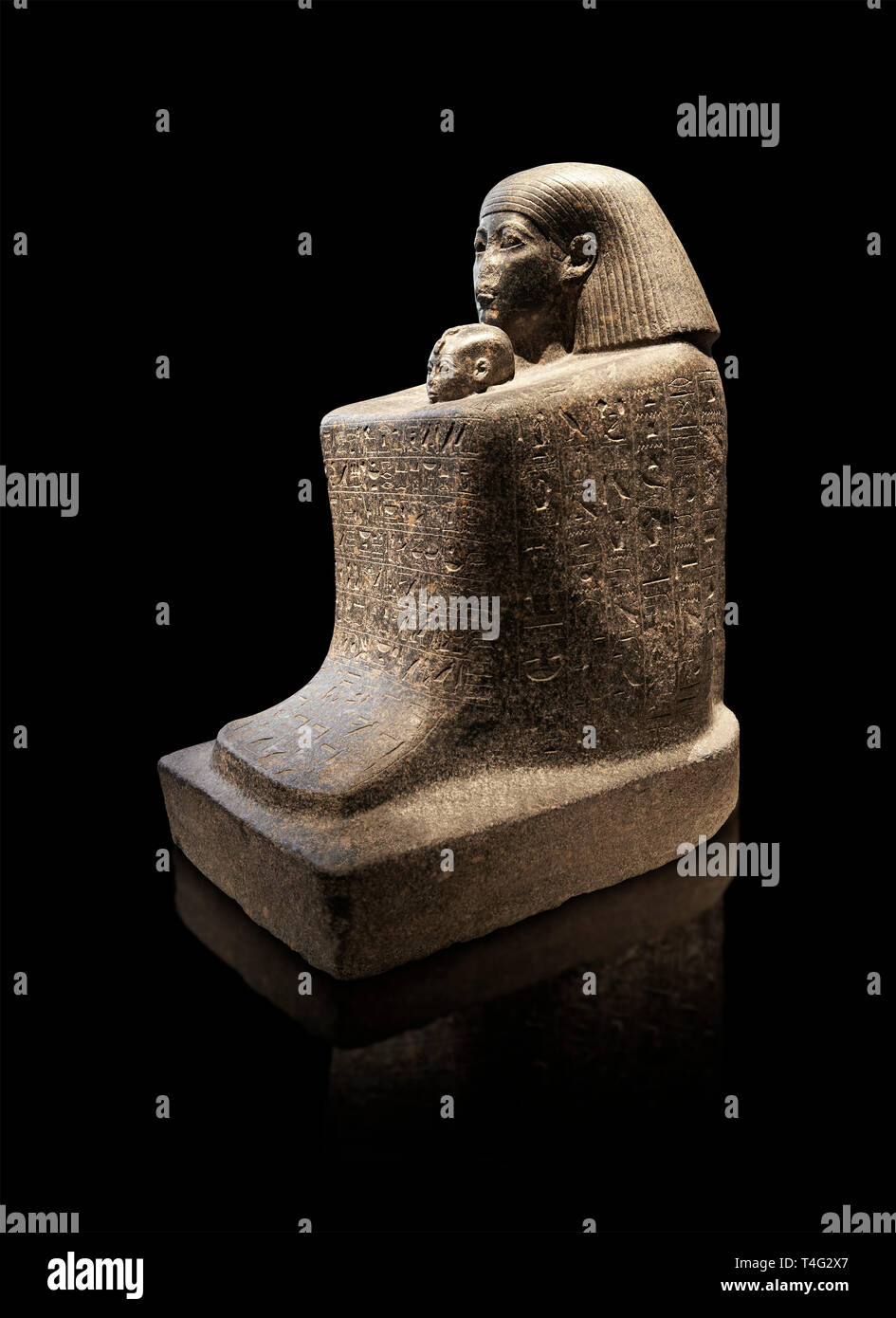 Ancient Egyptian granite block statue of the steward Haruafrom Thebes. 26th Dynasty 500 BC. Neues Museum Berlin AM 8163. Stock Photo