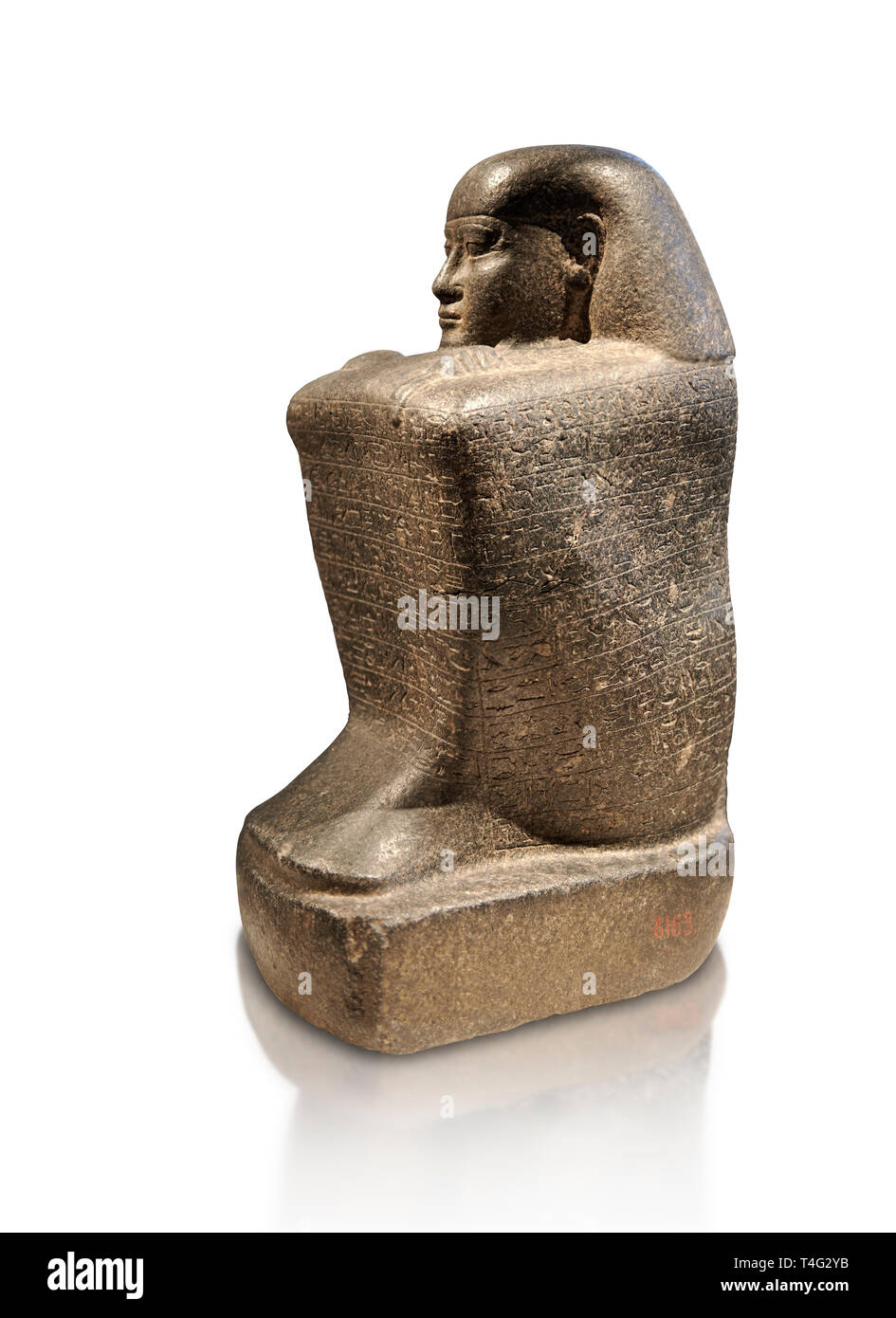 Ancient Egyptian granite block statue of the steward Haruafrom Thebes. 26th Dynasty 500 BC. Neues Museum Berlin AM 8163. Stock Photo