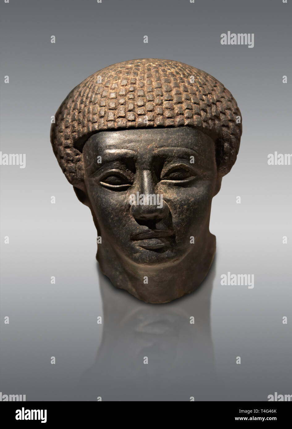 Granite ancient Egyptian statue head of a man from Thebes. 2000 BC . Neues Reich Museum Berlin Cat No: AM 1254. Stock Photo