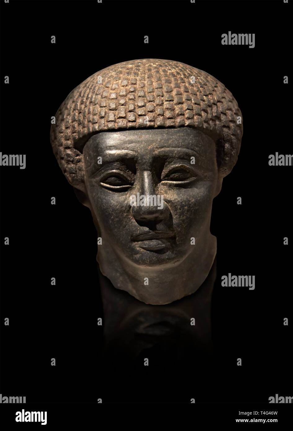 Granite ancient Egyptian statue head of a man from Thebes. 2000 BC . Neues Reich Museum Berlin Cat No: AM 1254. Stock Photo