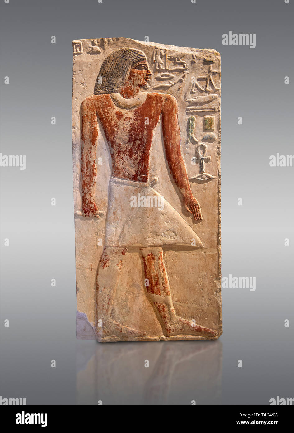 Ancient Egyptian tomb relief sculpture depicting the scribe and judge Ankhirptah. Middle Kingdom Egypt, 2170 BC. Neues Museum Berlin Cat No: AM 7337 Stock Photo