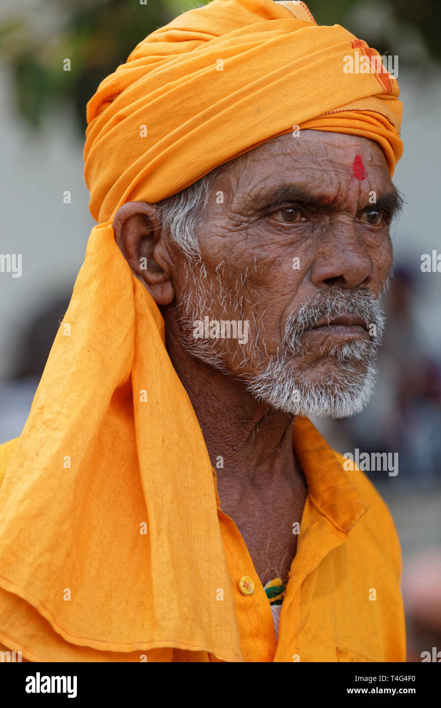 PUSHKAR, INDIA, October 28, 2017 : Portrait of old indian man. Pushkar Camel fair is one of the largest cattle fairs in the country with thousands of  Stock Photo