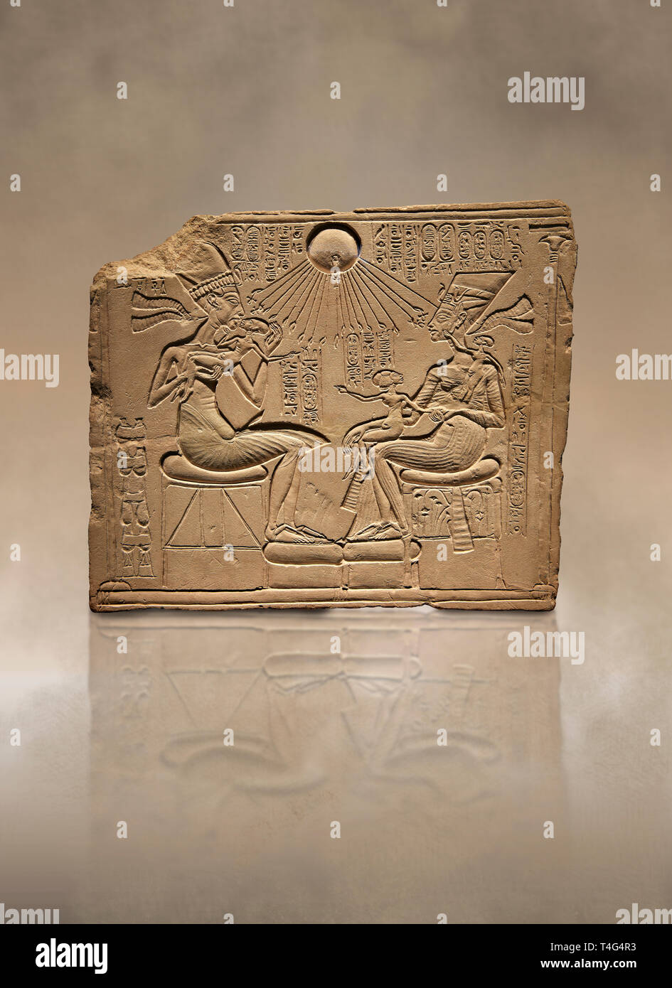 Ancient Egyptian house altar relief sculpture of Akhenaten, Nefertiti and their three daughters. 18th Dynasty 1345 BC . Neues Museum Berlin AM 14145 Stock Photo