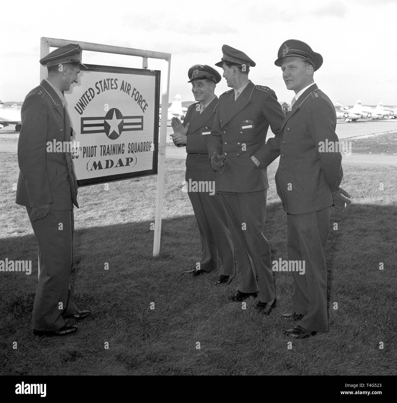 German airforce officers in the new German pilot uniforms on 16 January 1956 near the US pilot school Fuerstenfeldbruck, to which they had been assigned within the MDAP (Military Defense Assistance Program) on 16 January 1956 in Fuerstenfeldbruck (Bavaria, Germany). | usage worldwide Stock Photo