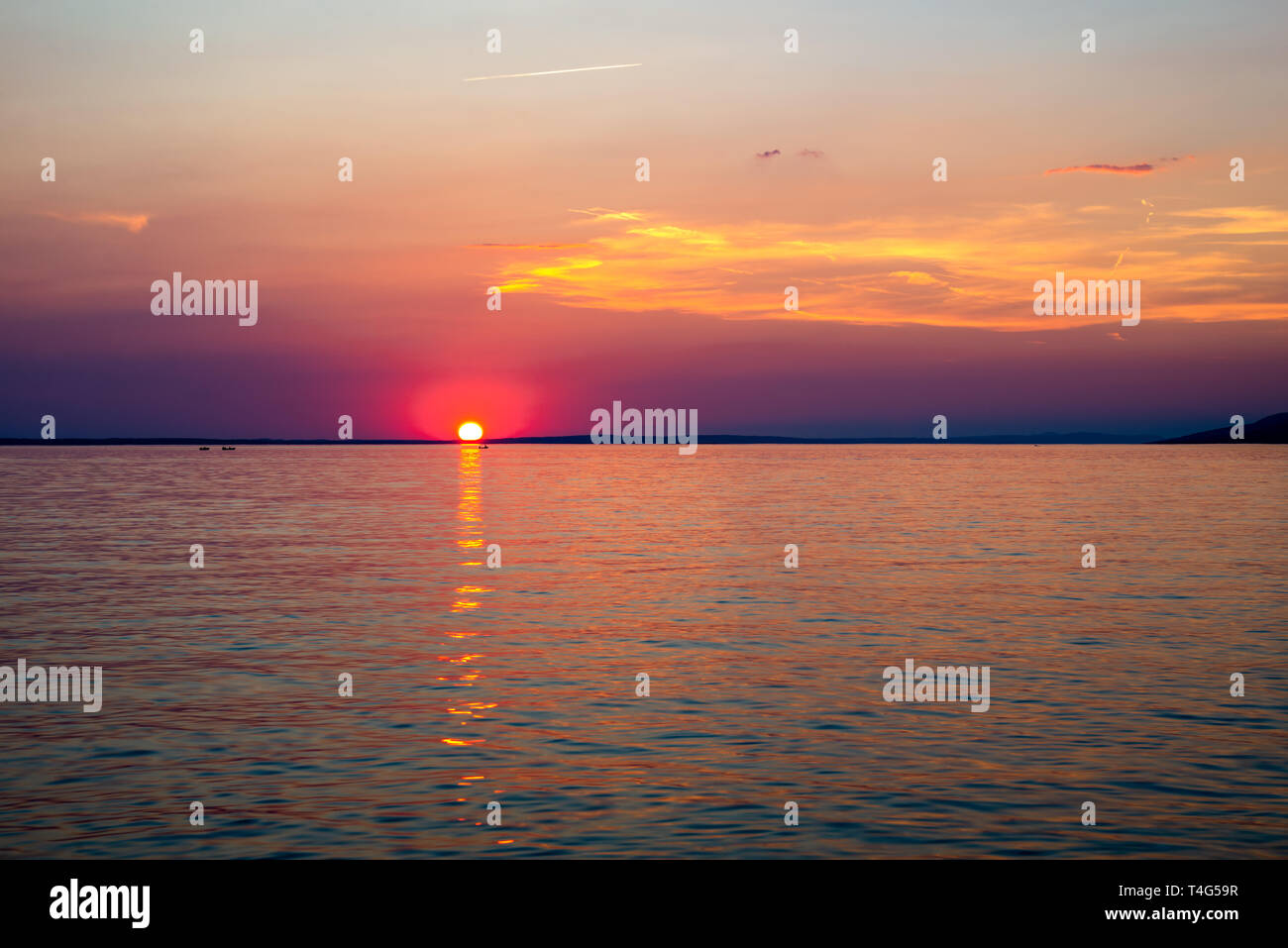 Sunset over Adriatic Sea with colourful dramatic sky near Starigrad in Dalmatia, Croatia. Stock Photo