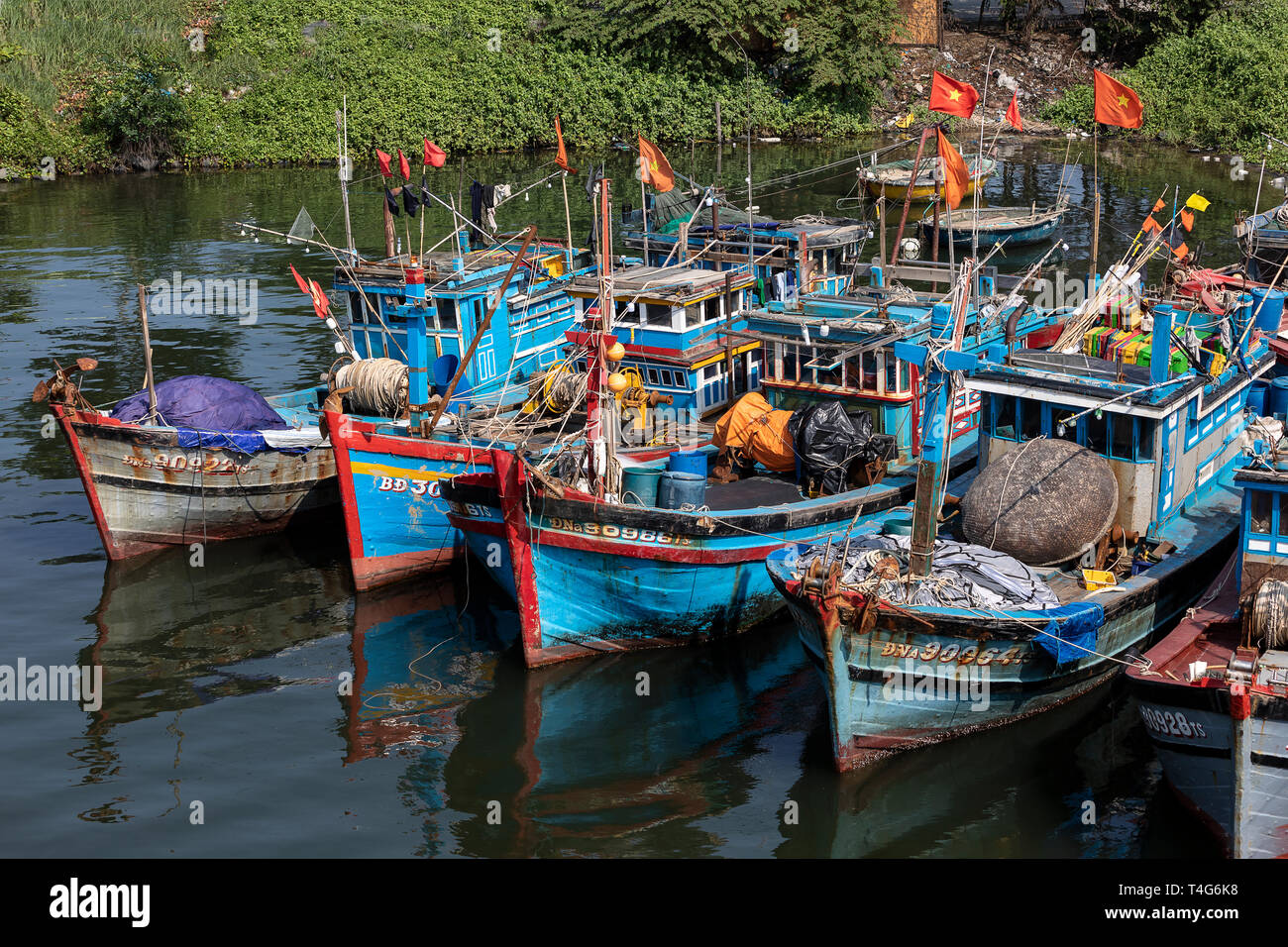 Blue Fishing Boats Moored On The Han River In Da Nang Vietnam Stock Photo