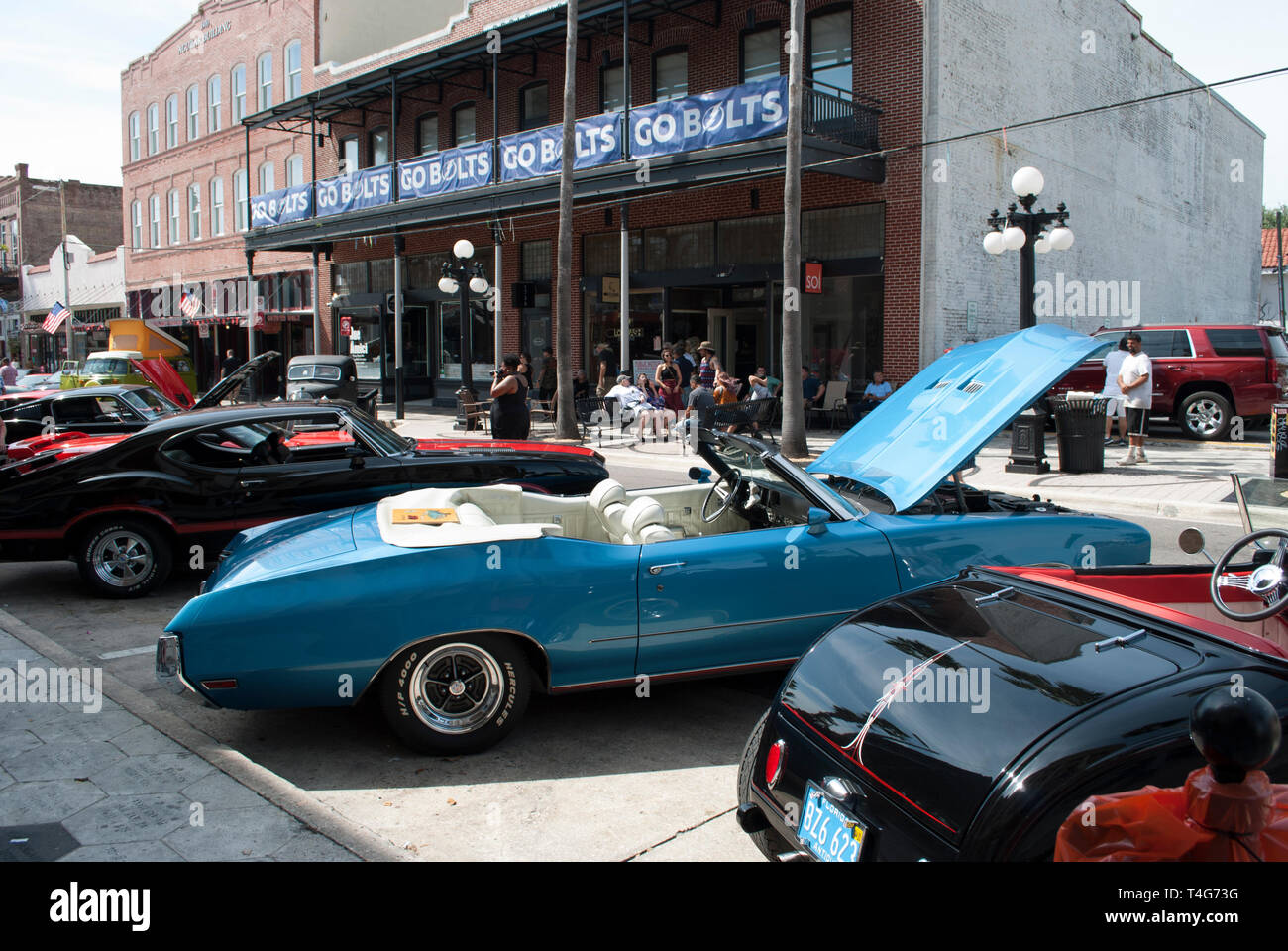 Retro cars parking on the street of old traditional American city