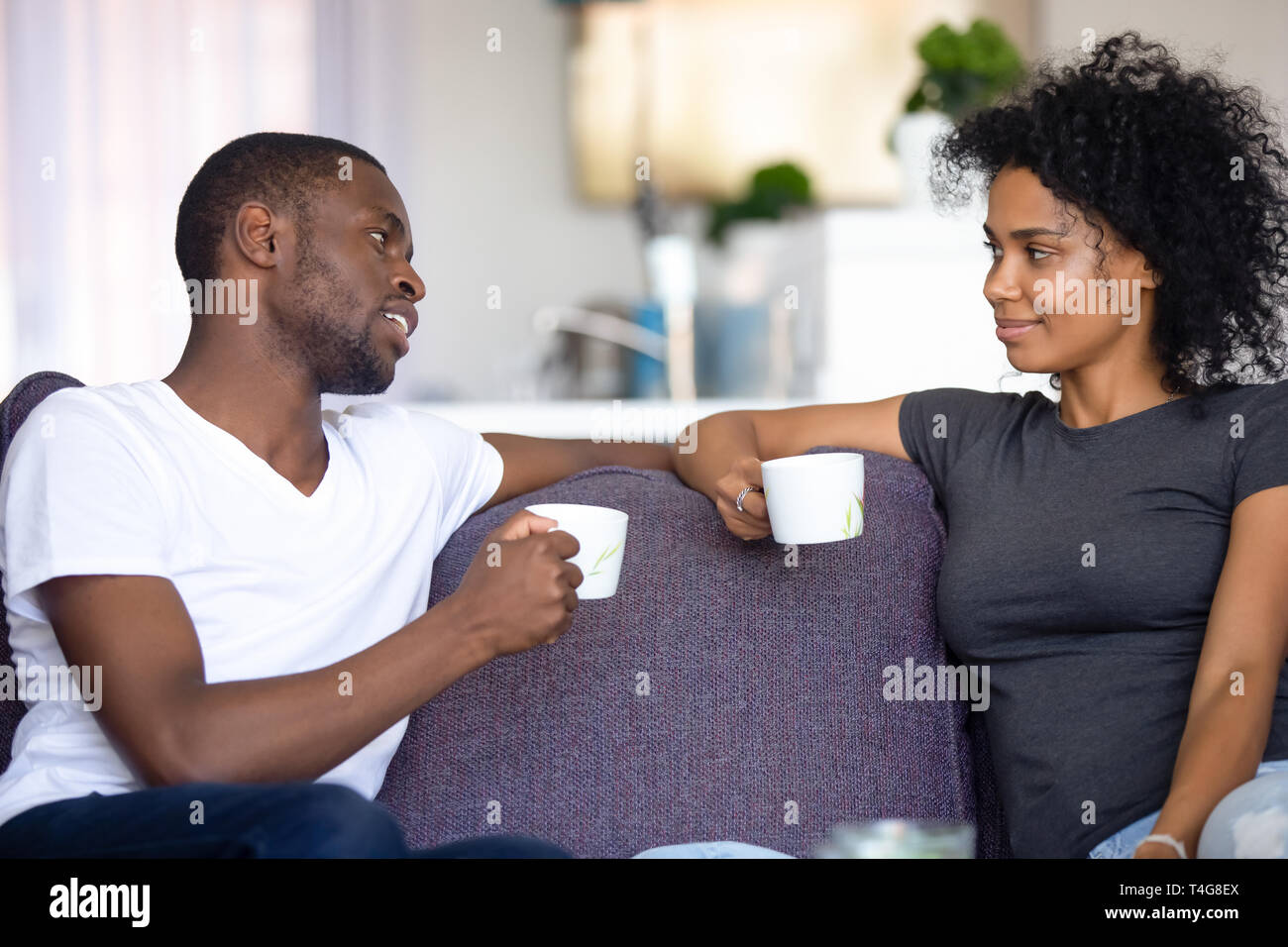 African american couple drinking coffee hi-res stock photography and ...