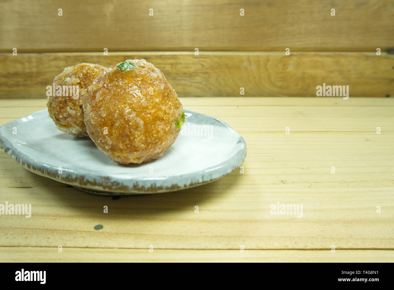 Khai Hong: sugar coating fried mung bean stuffed balls. Thai desserts. Stock Photo
