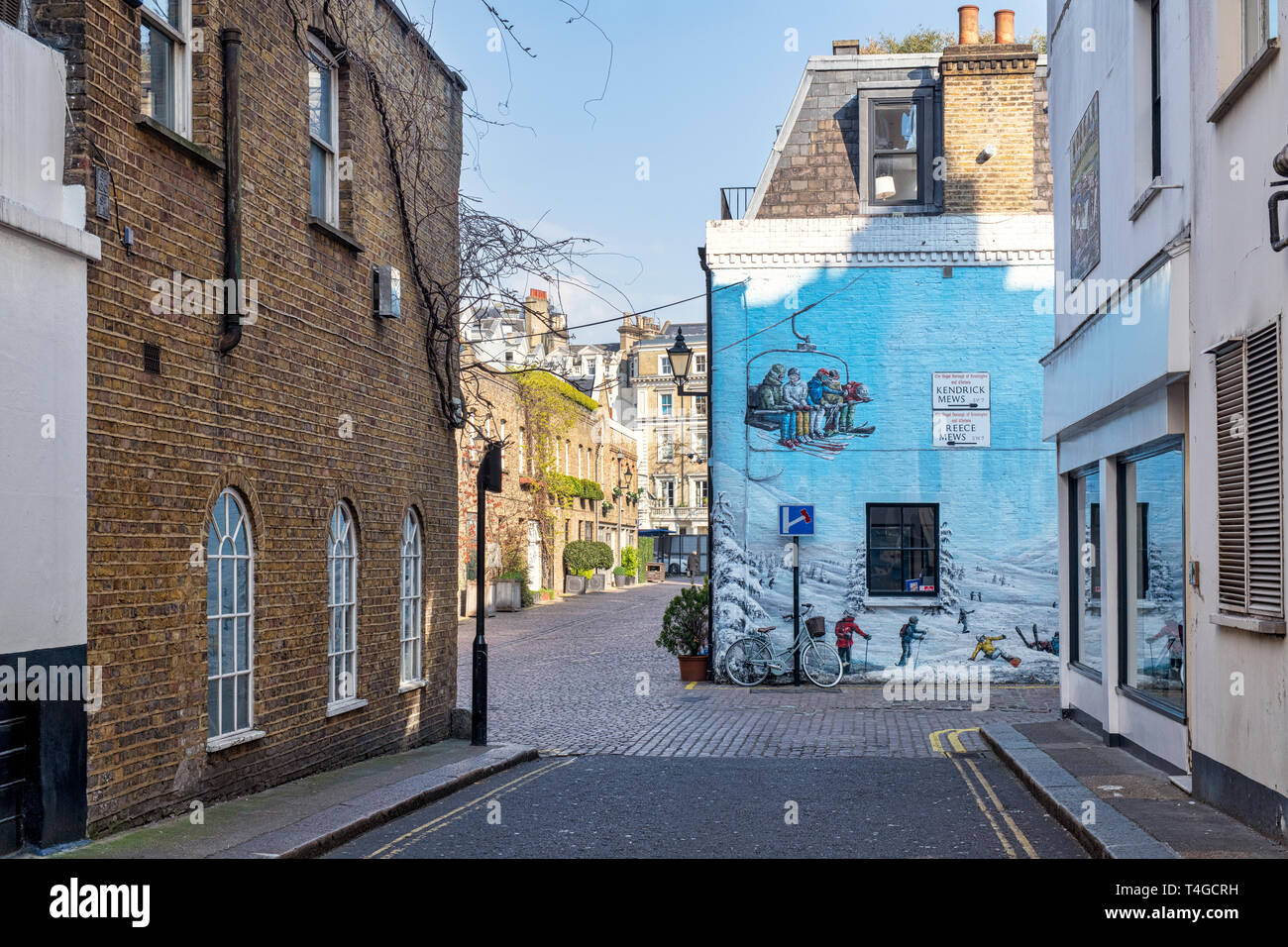 London houses and Ski Wall mural on a business property in Reece Mews, Kendrick place, South Kensington, SW7, London. England Stock Photo