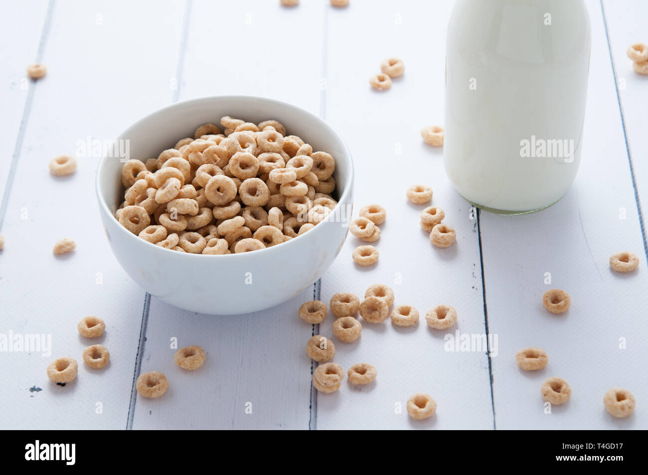 breakfast cereal in a bowl on a white wooden table Stock Photo