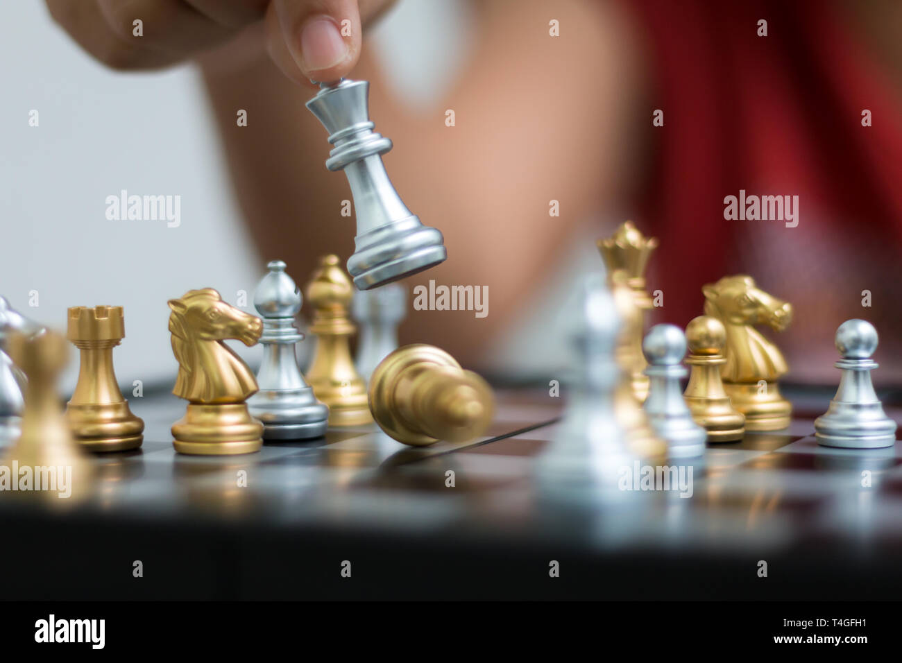 Two business women play chess hi-res stock photography and images - Alamy