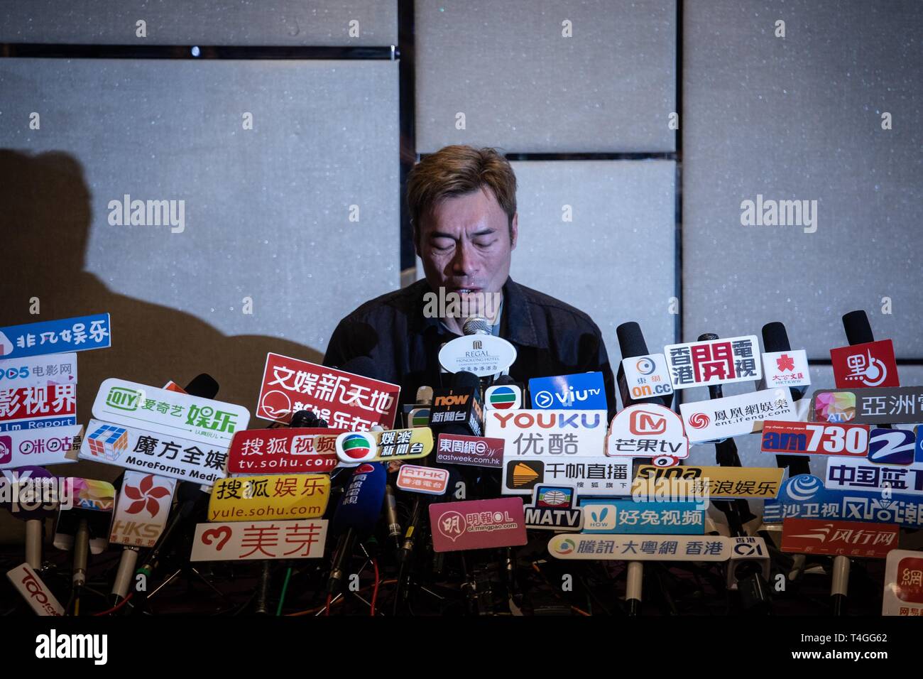 Hong Kong pop star Andy Hui Chi-on (51) seen speaking at a press conference addressing a scandal between him and the local actress Jacqueline Wong Sum-wing (30). Earlier today, local news outlet released a dashcam video showing Hui cheating on his wife Sammi Cheng Sau-man with Wong, while on a taxi ride home. Stock Photo