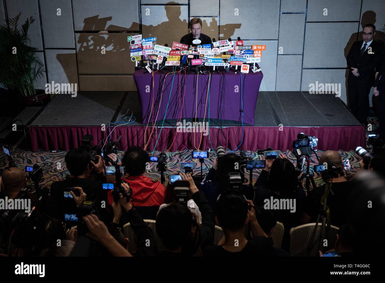 Hong Kong pop star Andy Hui Chi-on (51) seen speaking at a press conference addressing a scandal between him and the local actress Jacqueline Wong Sum-wing (30). Earlier today, local news outlet released a dashcam video showing Hui cheating on his wife Sammi Cheng Sau-man with Wong, while on a taxi ride home. Stock Photo