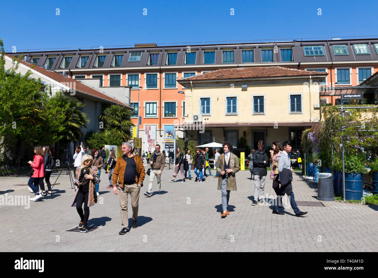 Milan, Italy - April 9, 2019. Visitors at the Opificio 31 in Tortona District during Milan Design Week 2019, the Fuorisalone. Professional and curious Stock Photo