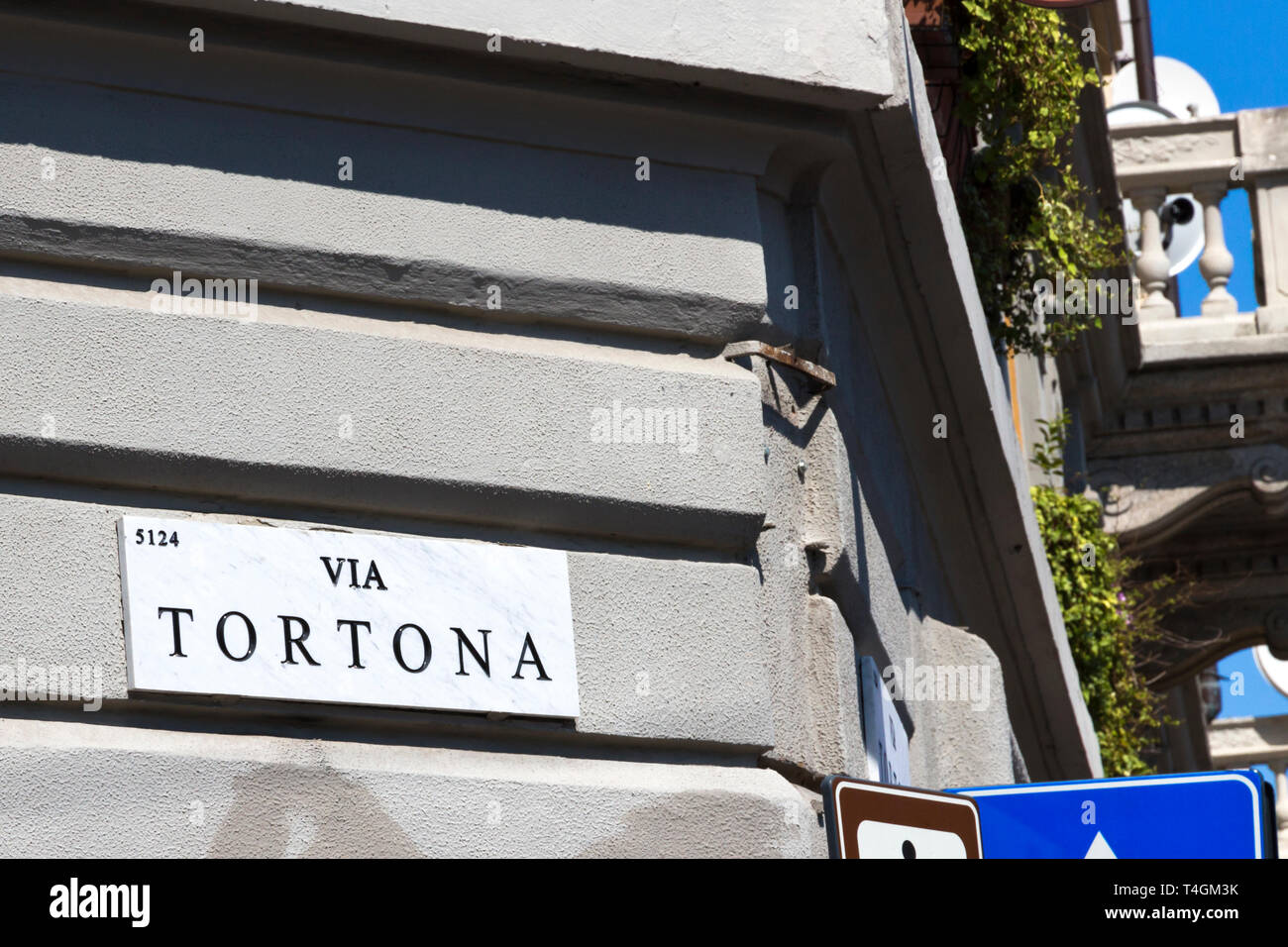 Milan, street sign, Via Tortona - marble panel with the road name. Tortona district important for the fashion and design sectors, Lombardy Italy Stock Photo