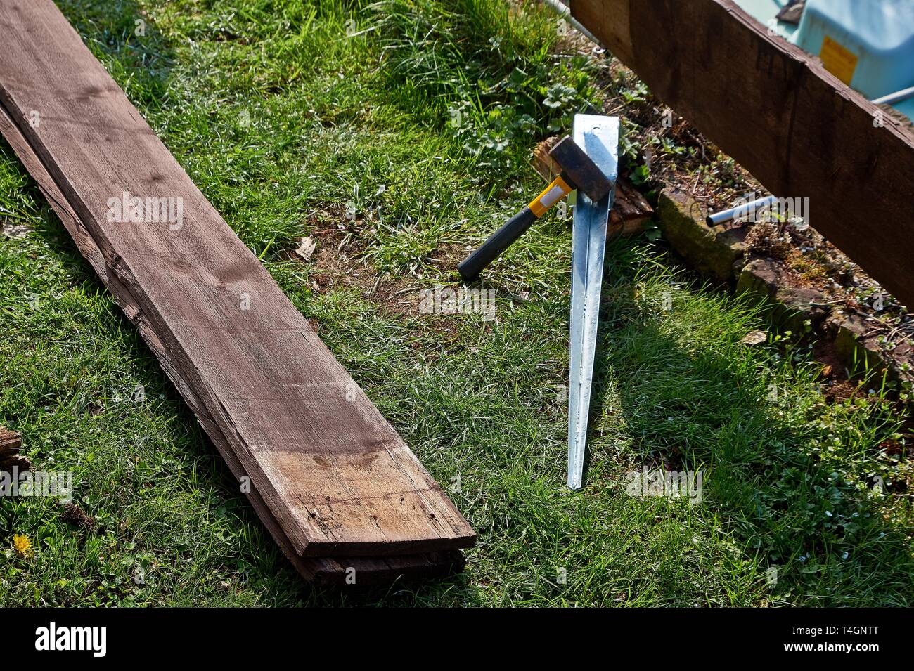 ground felling sleeves of galvanized metal for wood posts Stock Photo