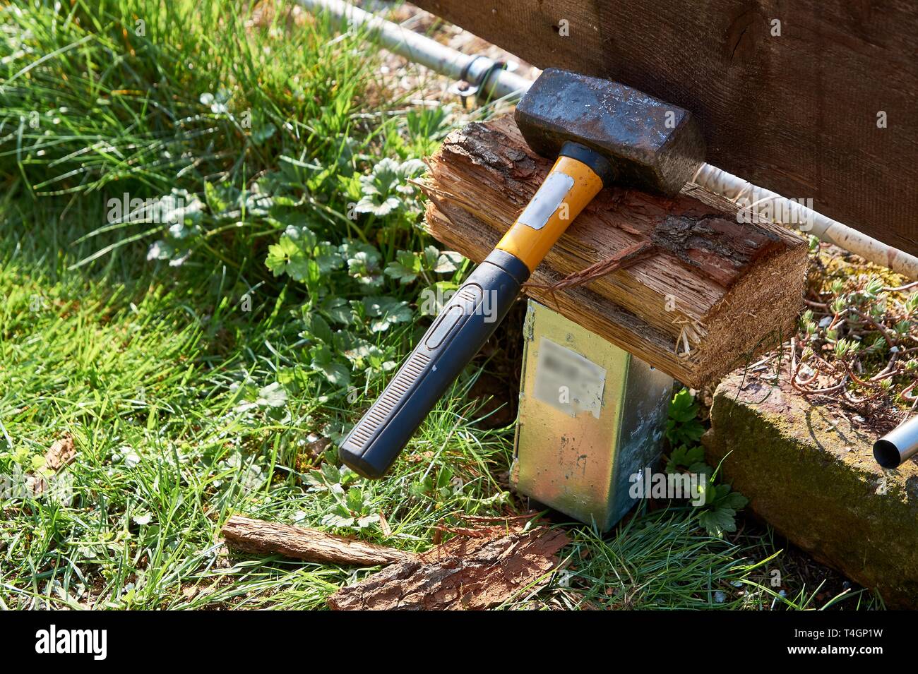 ground felling sleeves of galvanized metal for wood posts Stock Photo