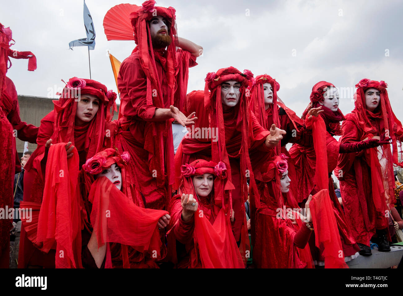 Extinction Rebellion environmental activists occupy Waterloo Bridge, London. Performance group Invisible Circus participate in the protest. Stock Photo
