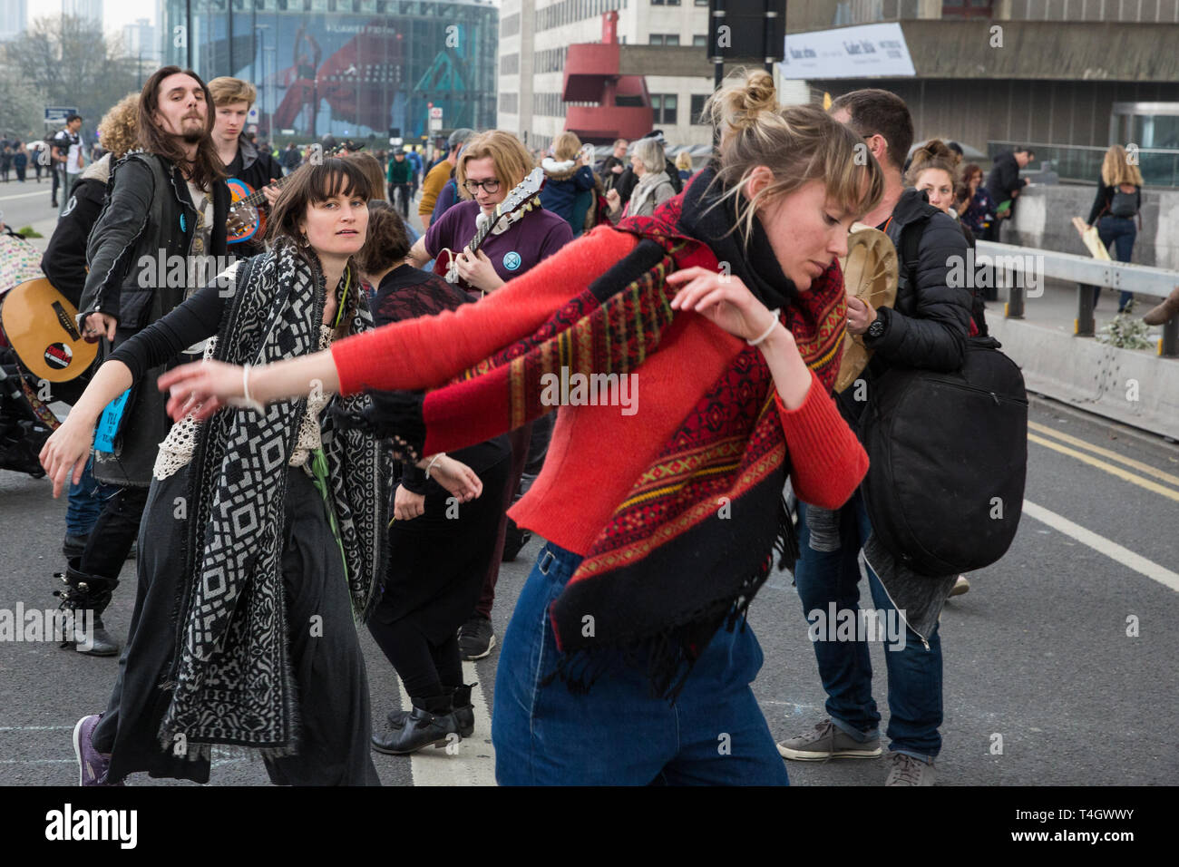 London, UK. 16th April 2019. Climate change activists from Extinction Rebellion dance as they occupy Waterloo Bridge on the second day of Internationa Stock Photo
