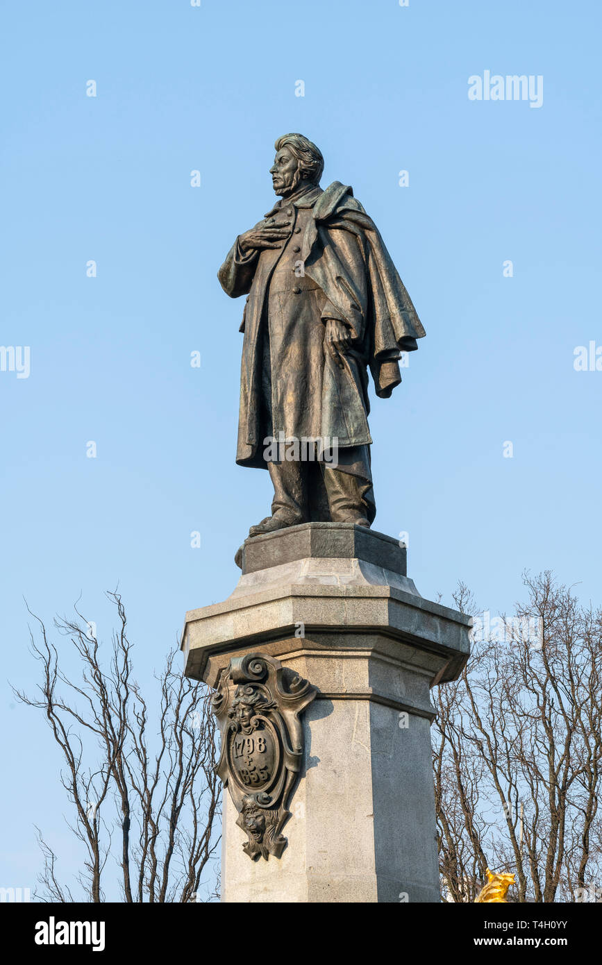 Warsaw, Poland. April 2019.   A view  of the monument of Adam Mickiewicz in a garden in Warsaw Stock Photo