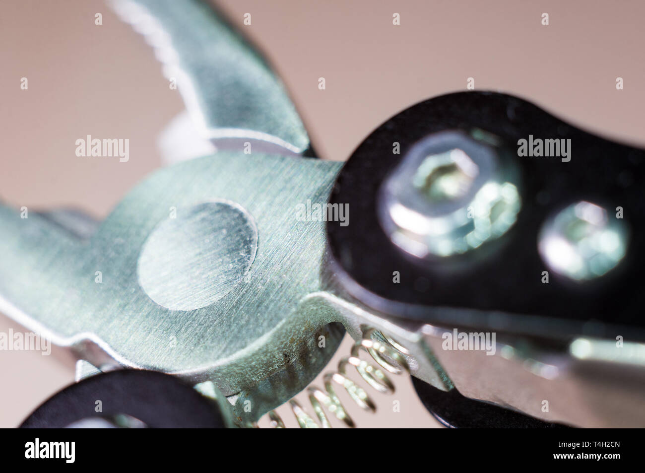 elements small foldable steel multitool, closeup, macro Stock Photo