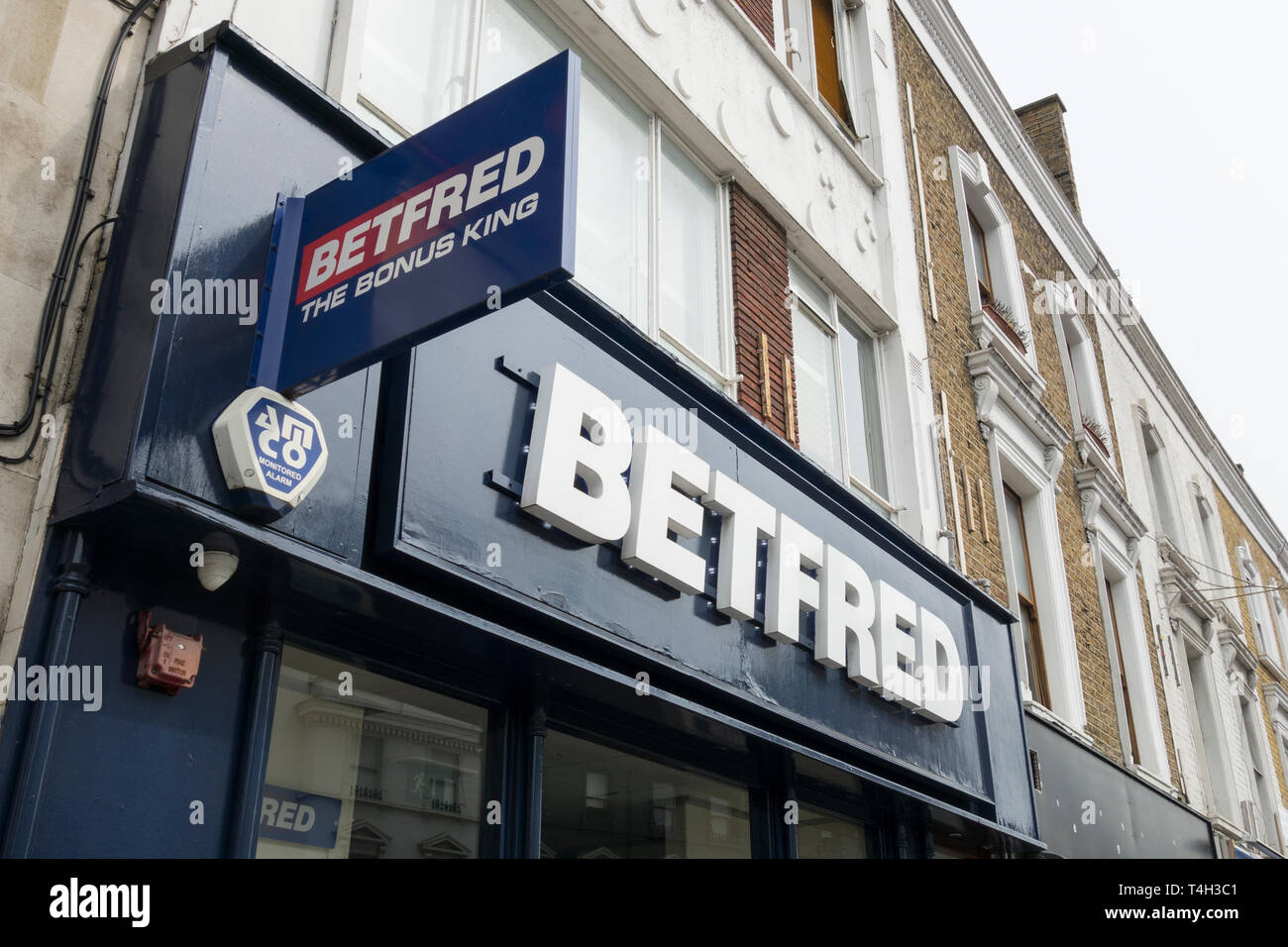 Exterior of BETFRED bookmakers betting shop in Fulham, London, UK Stock Photo