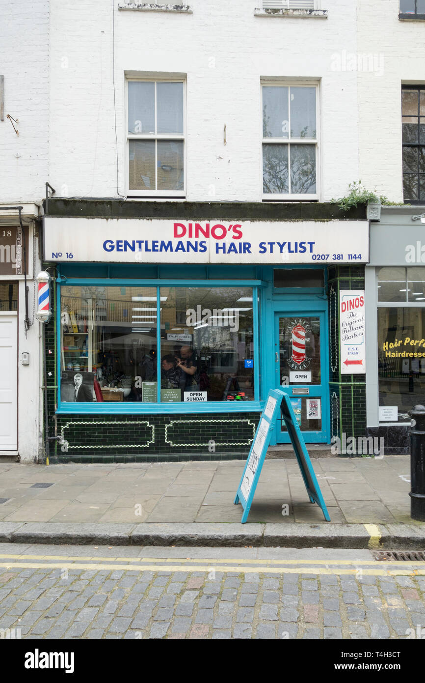 Dino's Gentleman's Hair Stylist shop front in Fulham, London, UK Stock Photo