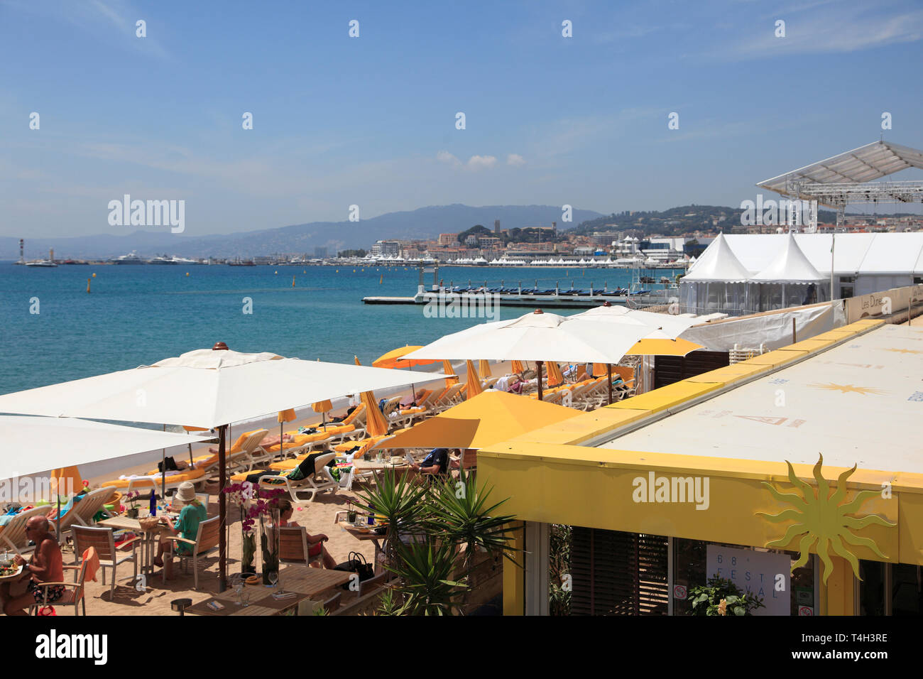 Cannes beach umbrella hi-res stock photography and images - Alamy