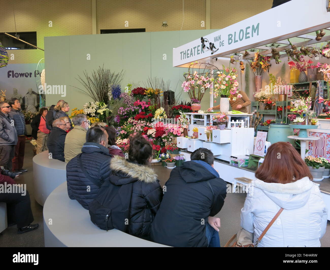 Audience watches the flower arranging demonstration at the Flower