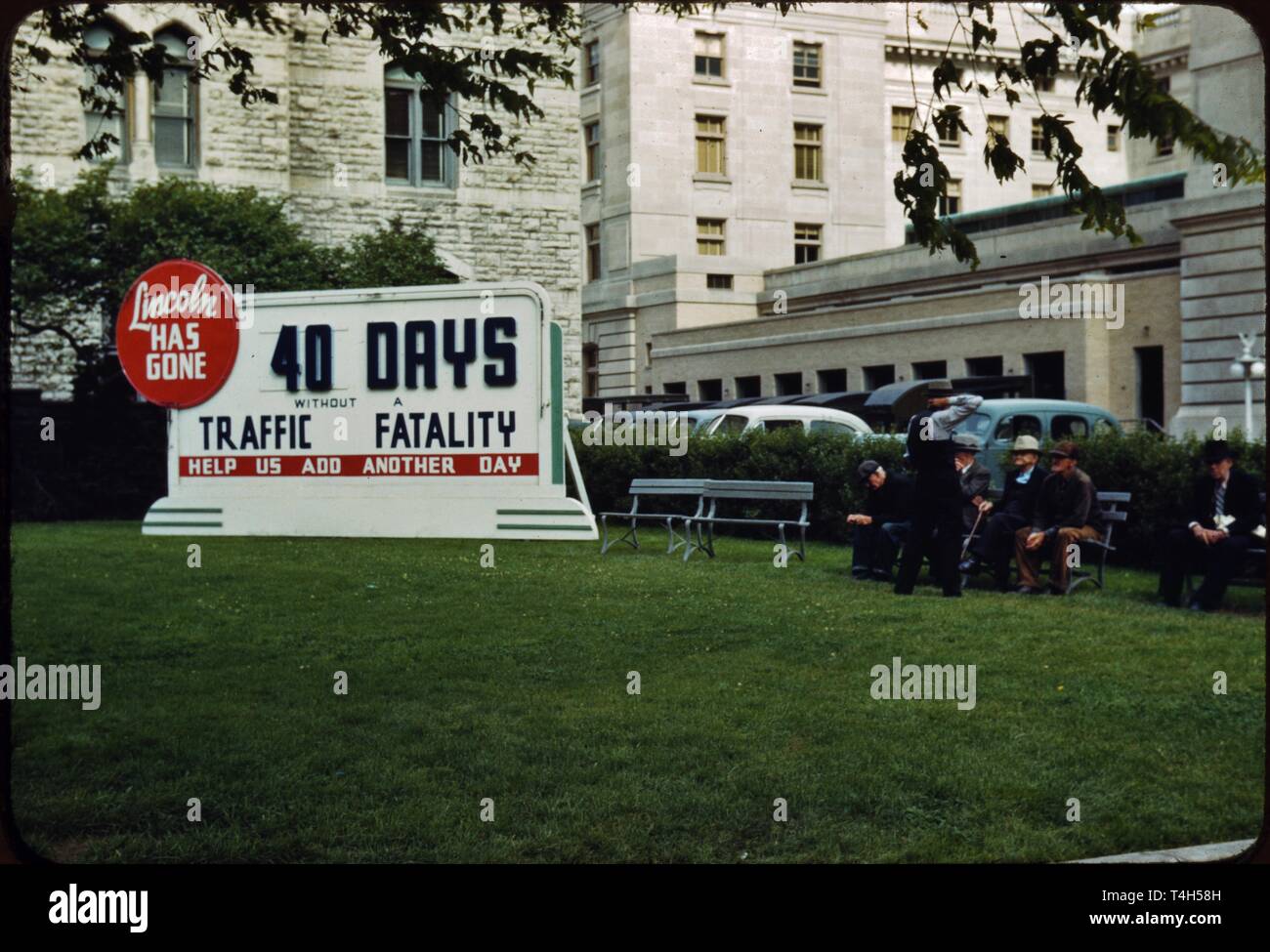 Vintage cars from the 1930s and 40s presented in a photo from the time