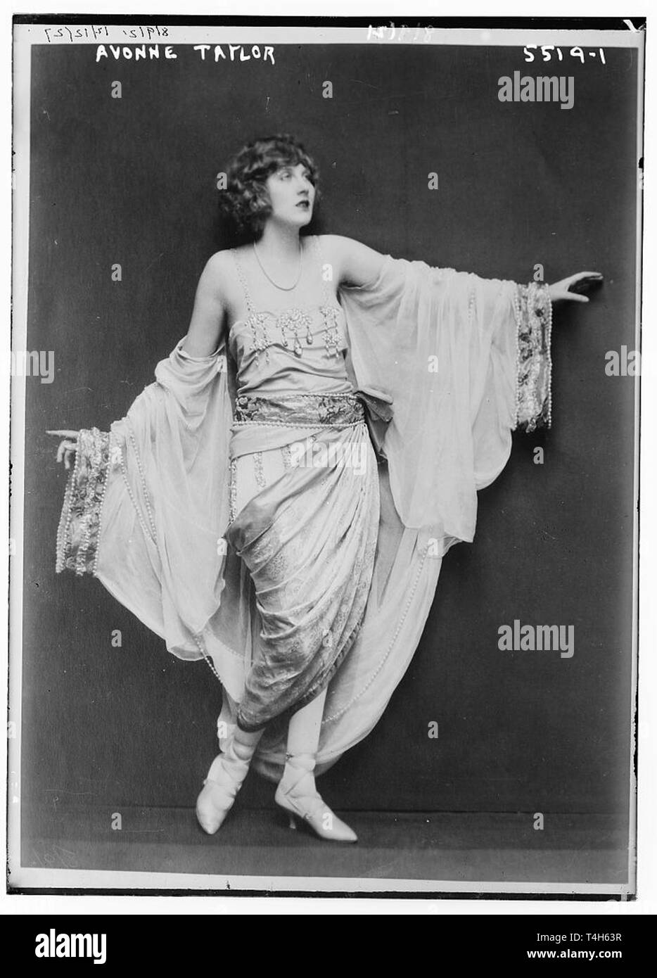 vintage photo of a woman in costume Stock Photo