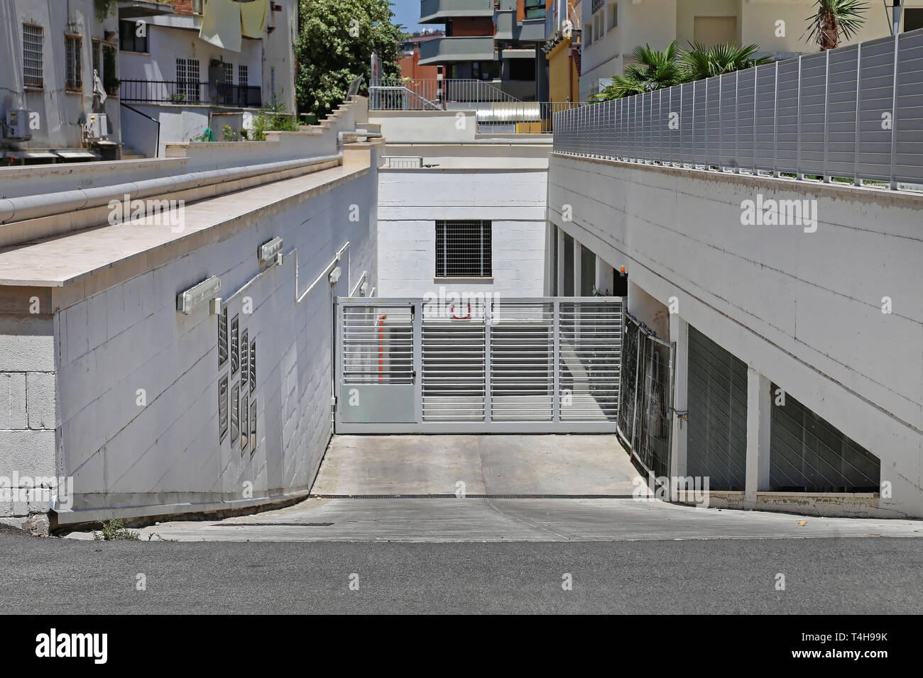 Underground Parking Garage With Gate Protection Stock Photo