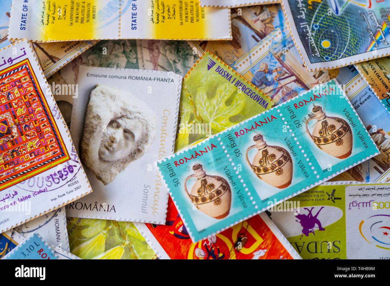 Collection of used postage stamps from around the world Stock Photo