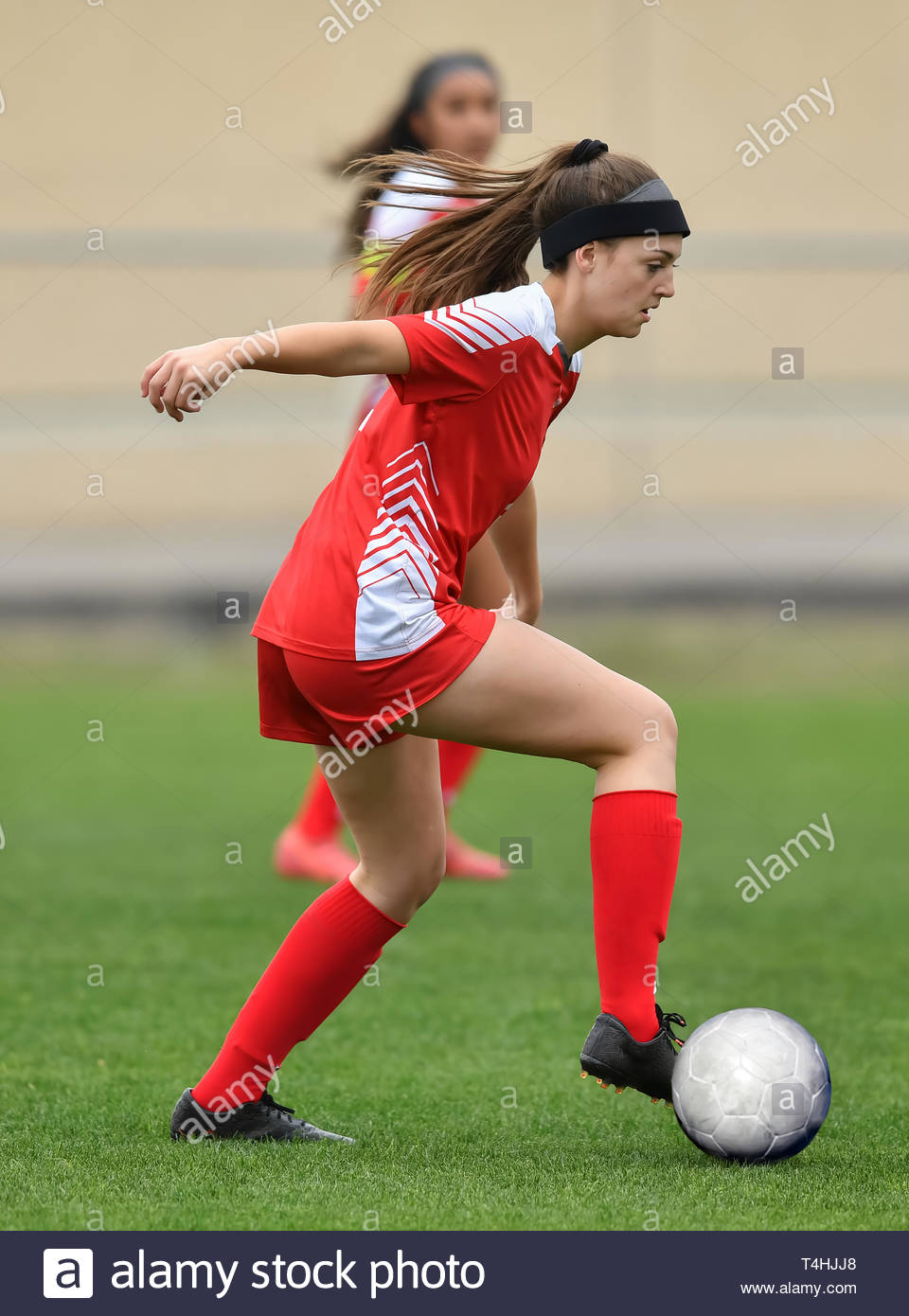girl in soccer uniform