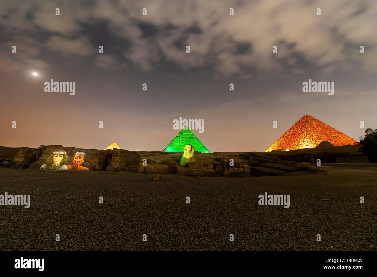 Giza pyramids and Sphinx light up at night Stock Photo - Alamy