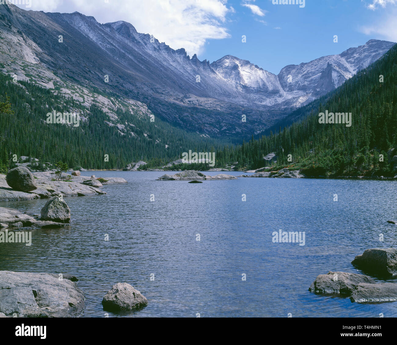 USA, Colorado, Rocky Mountain National Park, Early fall snow on peaks above Mills Lake including Longs Peak (upper left) and Pagoda Peak (center). Stock Photo