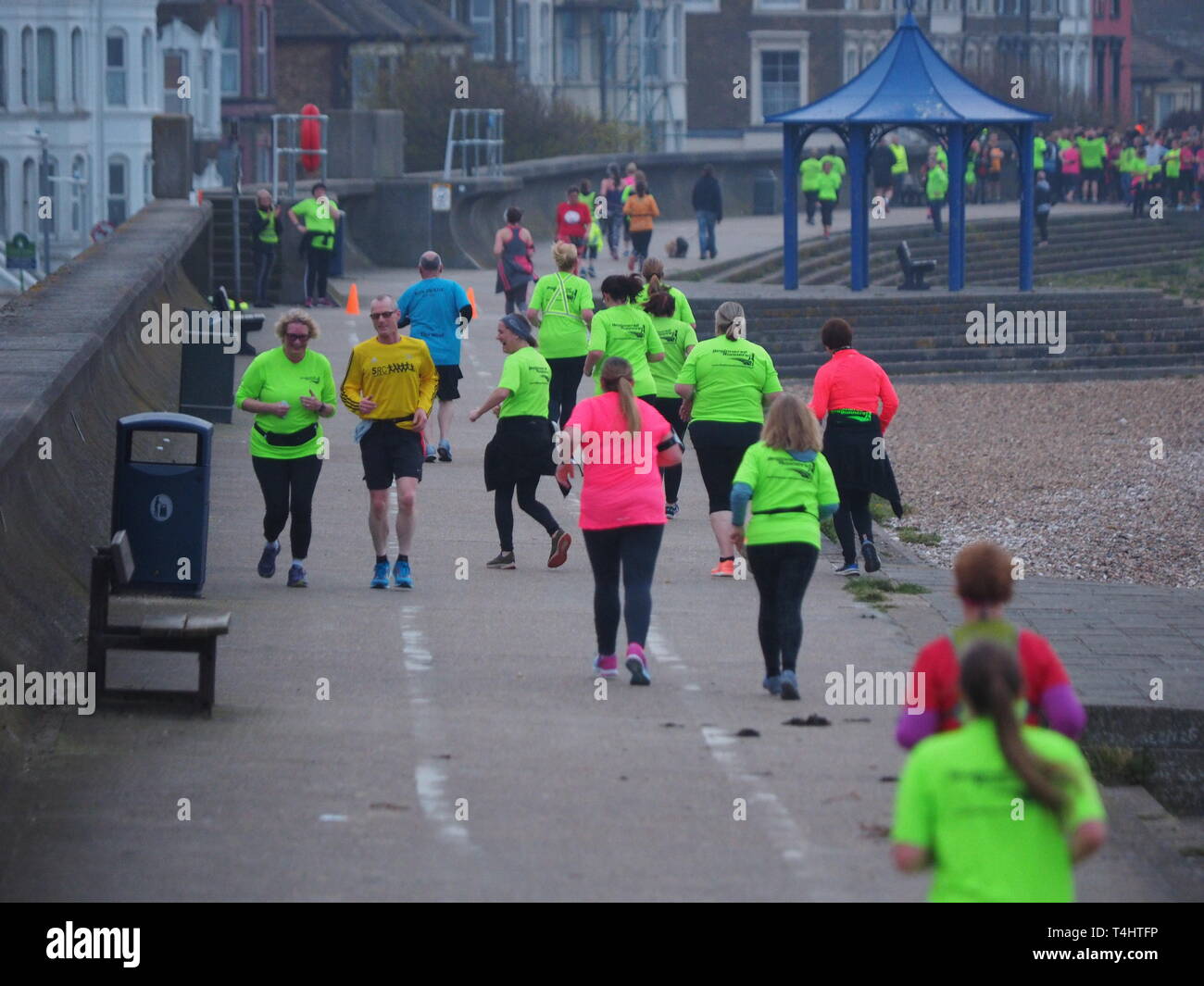 Sheerness, Kent, UK. 16th April, 2019. UK Weather: a misty evening with light winds in Sheerness, Kent. Hundreds of runners from local clubs in the region take part in a trial 'parkrun' to test the feasibility of setting up a weekly event along the seafront. Parkrun organise free, weekly, 5km timed runs around the world open to everyone. Credit: James Bell/Alamy Live News Stock Photo