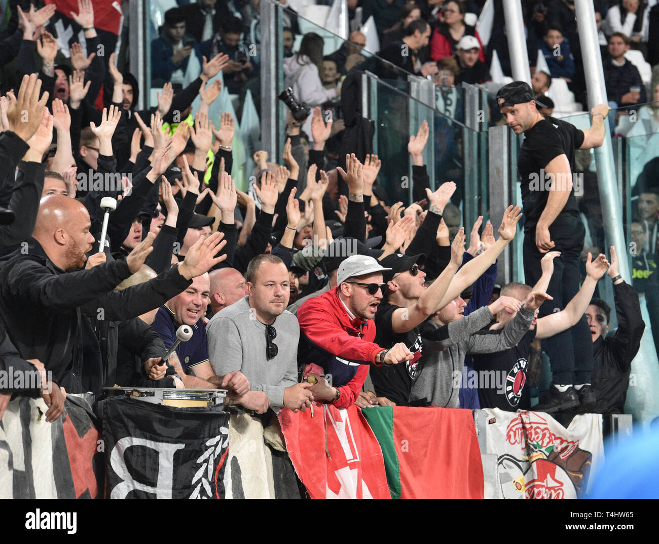 Turin, Italy. 16th Apr, 2019. Soccer: Champions League, knockout round, quarter-finals, second leg, Juventus Turin - Ajax Amsterdam. Fans of Ajax cheer before the game. Credit: Antonio Polia/dpa/Alamy Live News Stock Photo