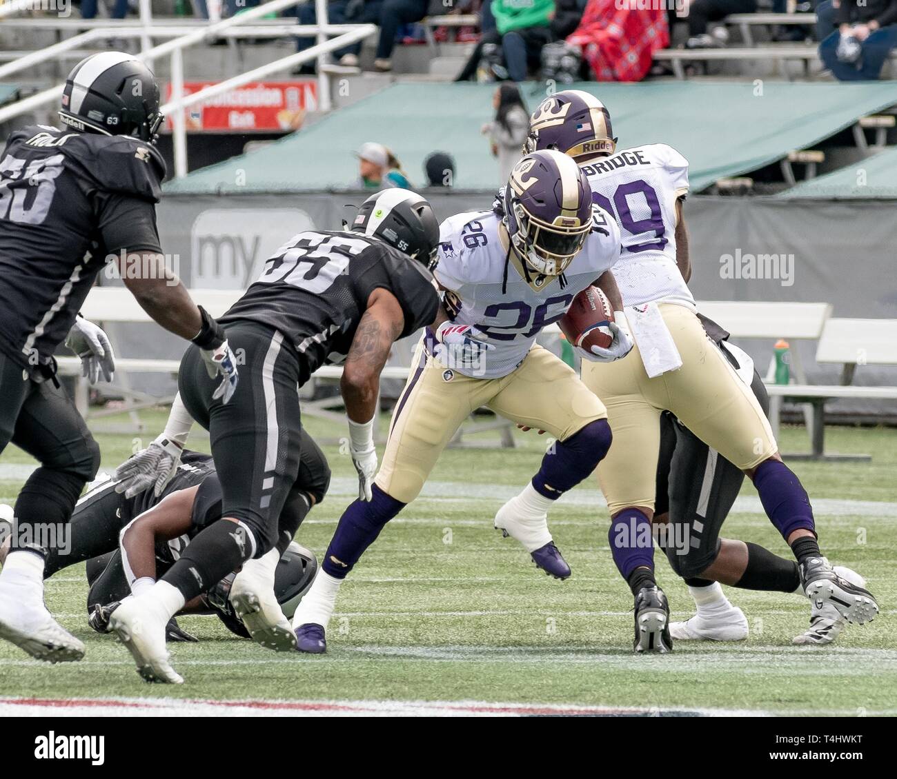 Birmingham, Alabama, USA. 31st Mar, 2019. The Birmingham Iron and the Atlanta Legends faced off in what was ultimately the last game for the two teams as the league dissolved just two days later. The Iron's home field is Legion Field, where the University of Alabama at Birmingham (UAB) plays. RB TEREAN FOLSTON (26) runs the ball during the game. Credit: Jeremy Raines/ZUMA Wire/Alamy Live News Stock Photo