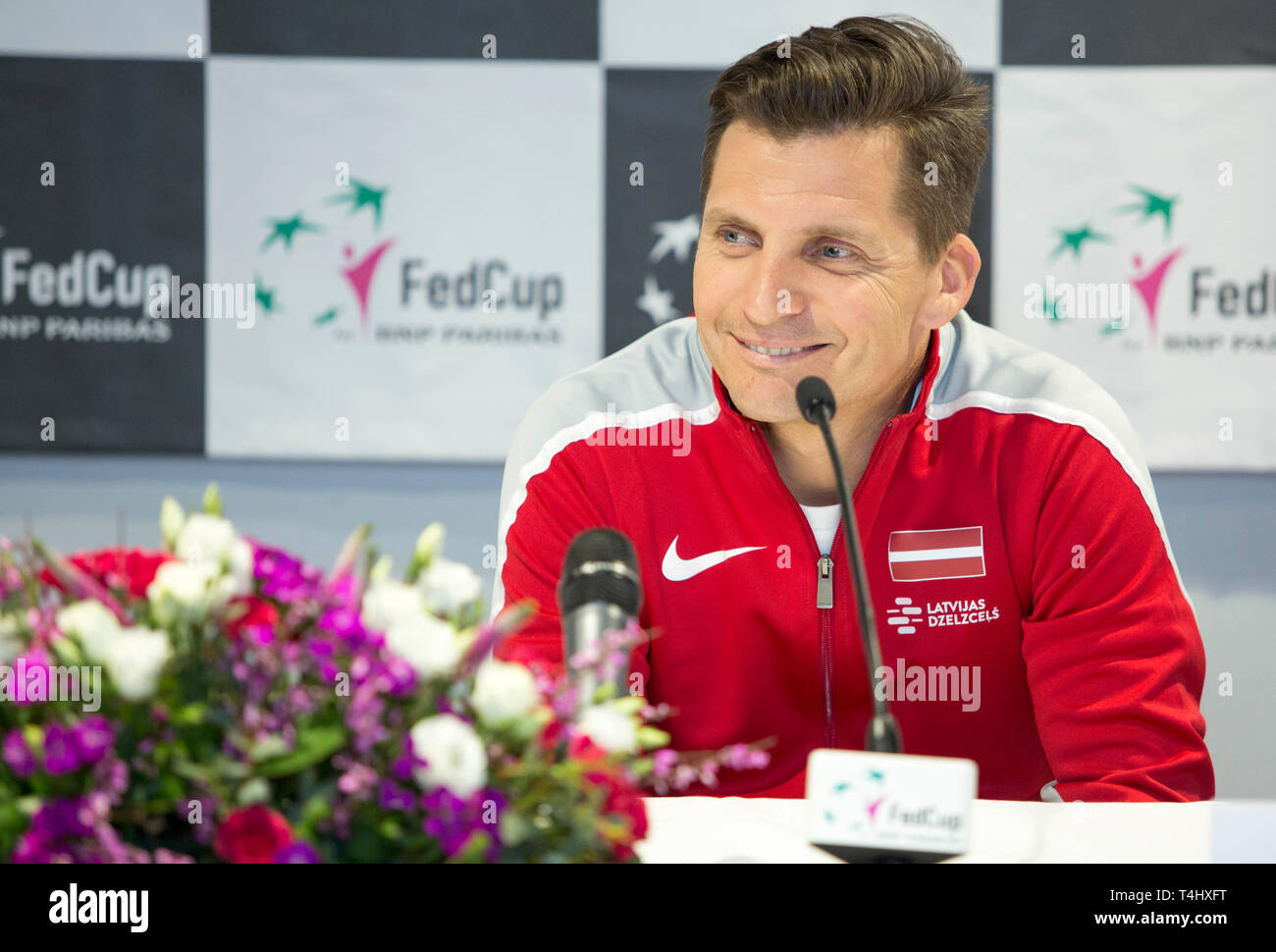 Riga, Latvia. 16th Apr, 2019. Adrians Zguns, captain of Team Latvia to the Feb Cup tennis tournament, reacts during a press conference prior to the Fed Cup in Riga, Latvia, April 16, 2019. Credit: Edijs Palens/Xinhua/Alamy Live News Stock Photo