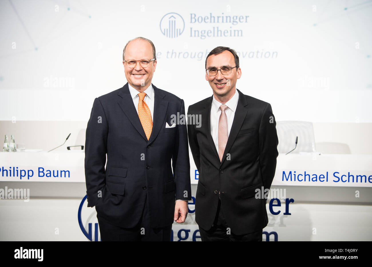 Ingelheim, Germany. 17th Apr, 2019. Hubertus von Baumbach (l), Chief  Executive Officer, and Michael Schmelmer, Chief Financial Officer, stand  side by side in front of the pension fund. The pharmaceutical company  Boehringer