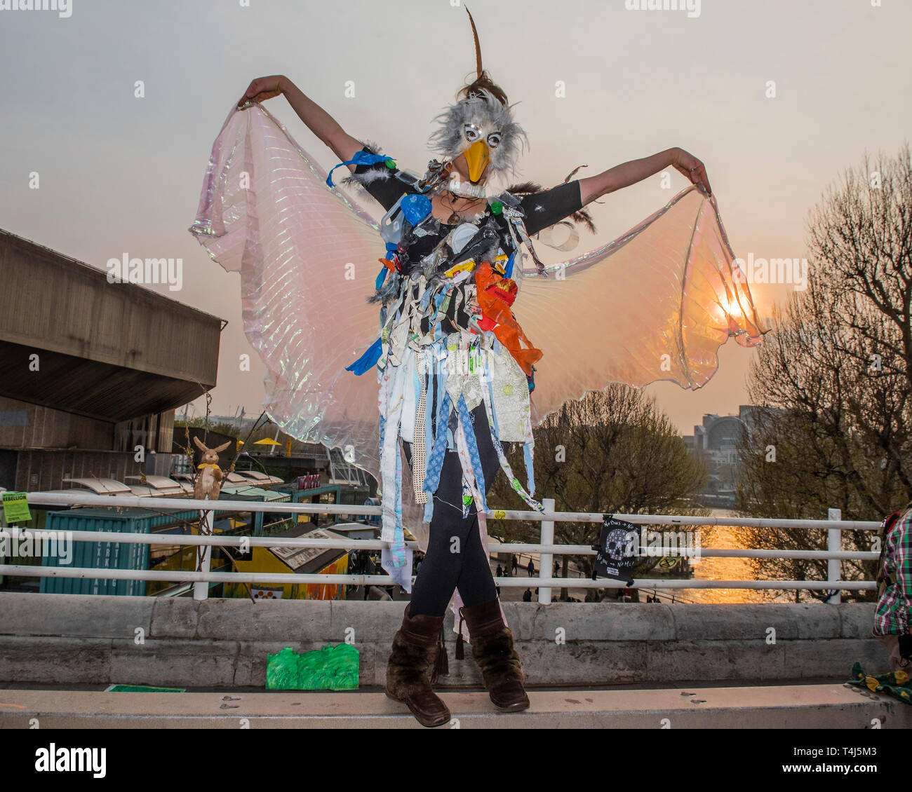 London, UK. 17th Apr, 2019. Dancers with dresses made out the plastic waste that is now being found in sea birds - The evening generally has a festival atmosphere - Day 3 - Protestors from Extinction Rebellion block several junctions in London as part of their ongoing protest to demand action by the UK Government on the 'climate chrisis'. The action is part of an international co-ordinated protest. Credit: Guy Bell/Alamy Live News Stock Photo