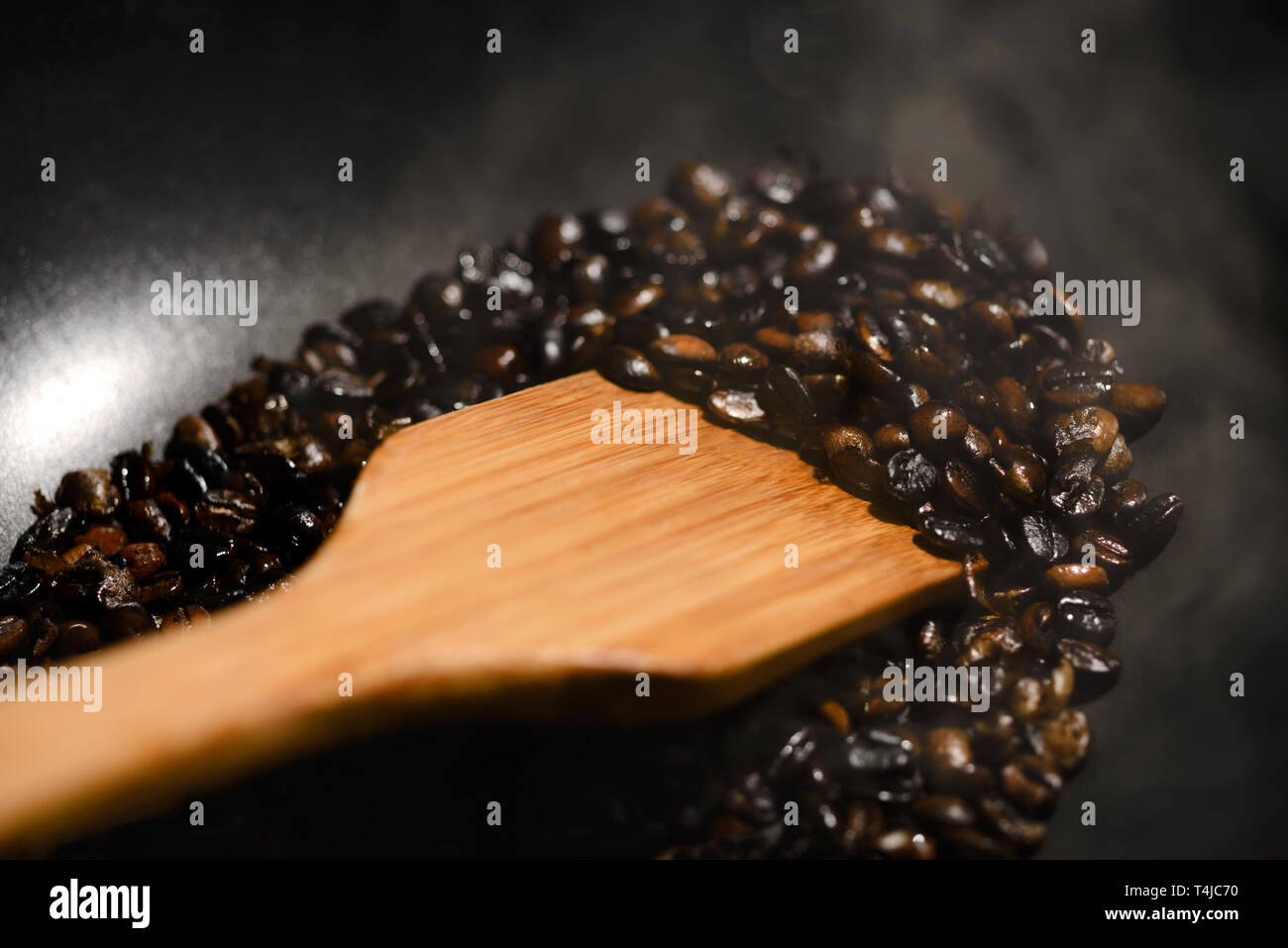 Fresh raw coffee beans roasting Stock Photo Alamy