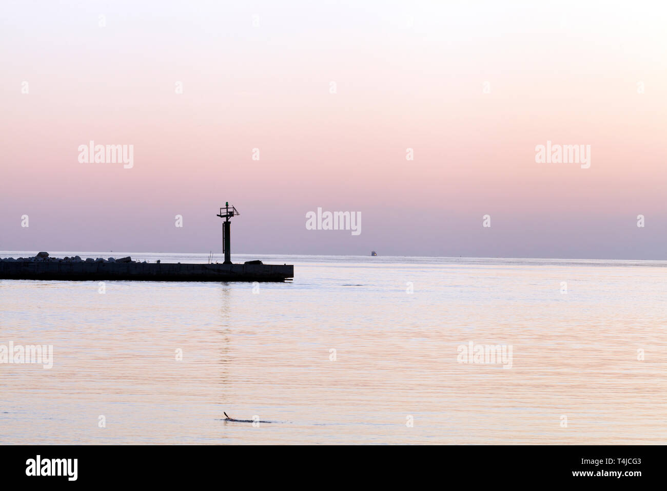 Pier at sunset, pastel colors . Stock Photo