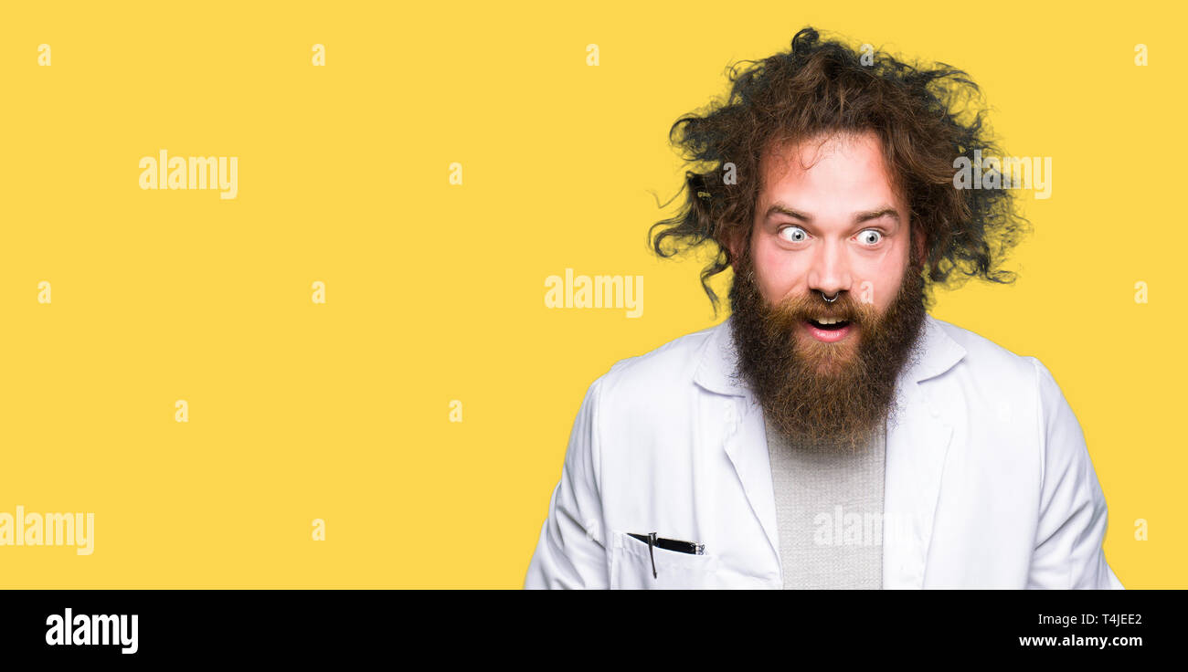 Crazy Scientist With Funny Long Hair Afraid And Shocked With