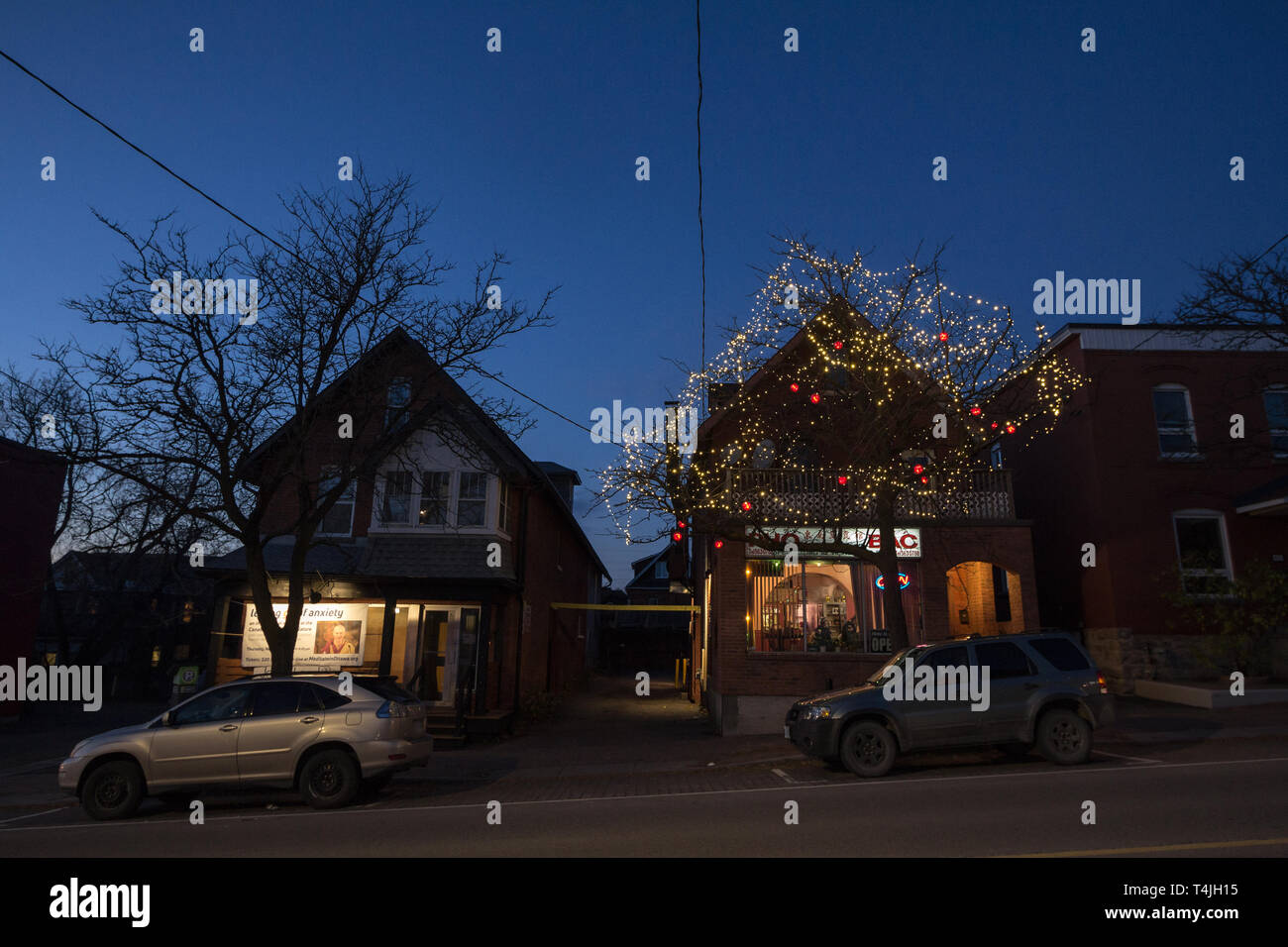 OTTAWA, CANADA - NOVEMBER 10, 2018: Typical north American wooden houses in a residential street in autumn in Ottawa, Ontario, during an autumn night  Stock Photo