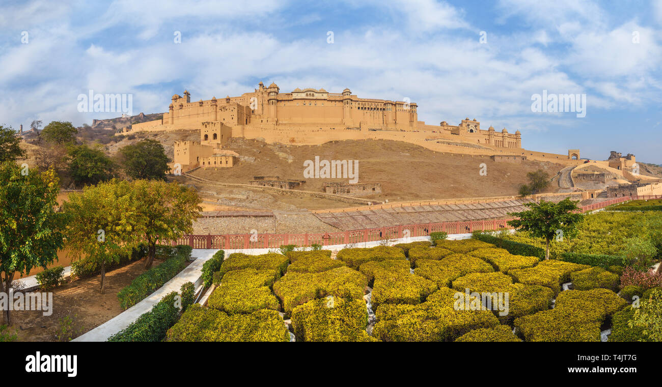 Panorama view of Amber fort and palace from Kesar Kyari Bagh garden on Maotha Lake. Jaipur. Rajasthan. India Stock Photo
