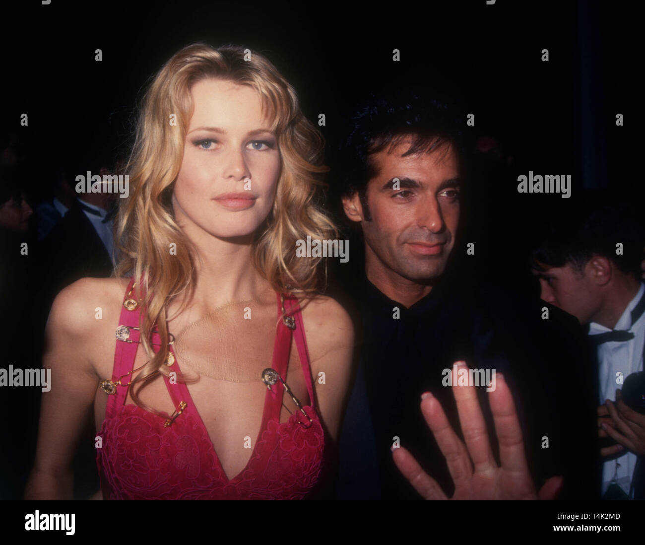Los Angeles, California, USA 21st March 1994  Model Claudia Schiffer and magician David Copperfield attend the 66th Annual Academy Awards on March 21, 1994 at Dorothy Chandler Pavilion in Los Angeles, California, USA. Photo by Barry King/Alamy Stock Photo Stock Photo