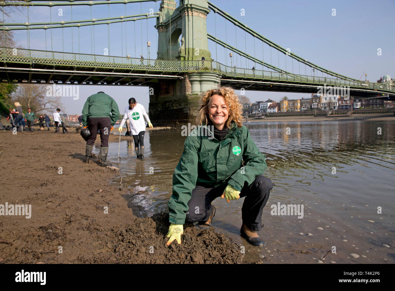 Kate Humble helps a team of people pick up litter during a special